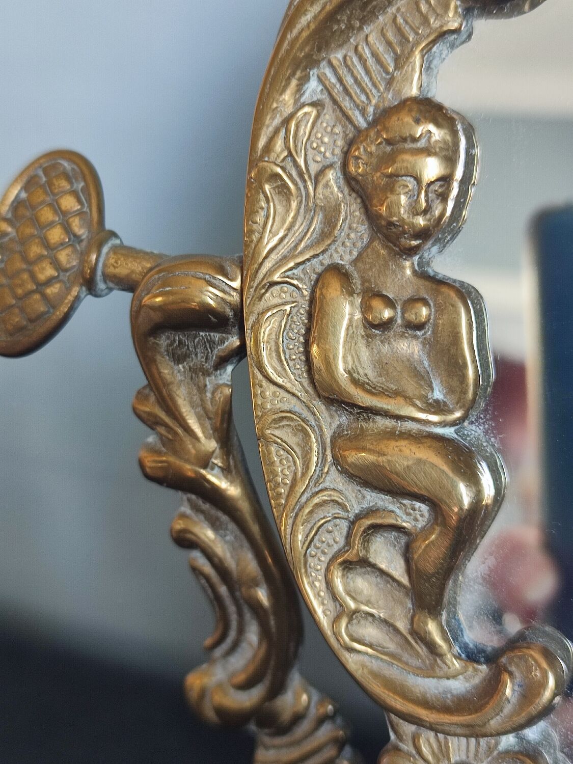 Ancient mirror psyche in bronze