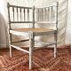 Fauteuil coin de cheminée XIXe , bois et cannage