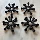 4 "Spider" candle holders by Jens Quistgaard for Dansk Designs, Scandinavian 1960s.