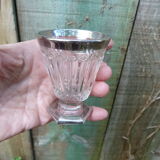 Stemmed glass for antique glass liquor with silver sides and patterns