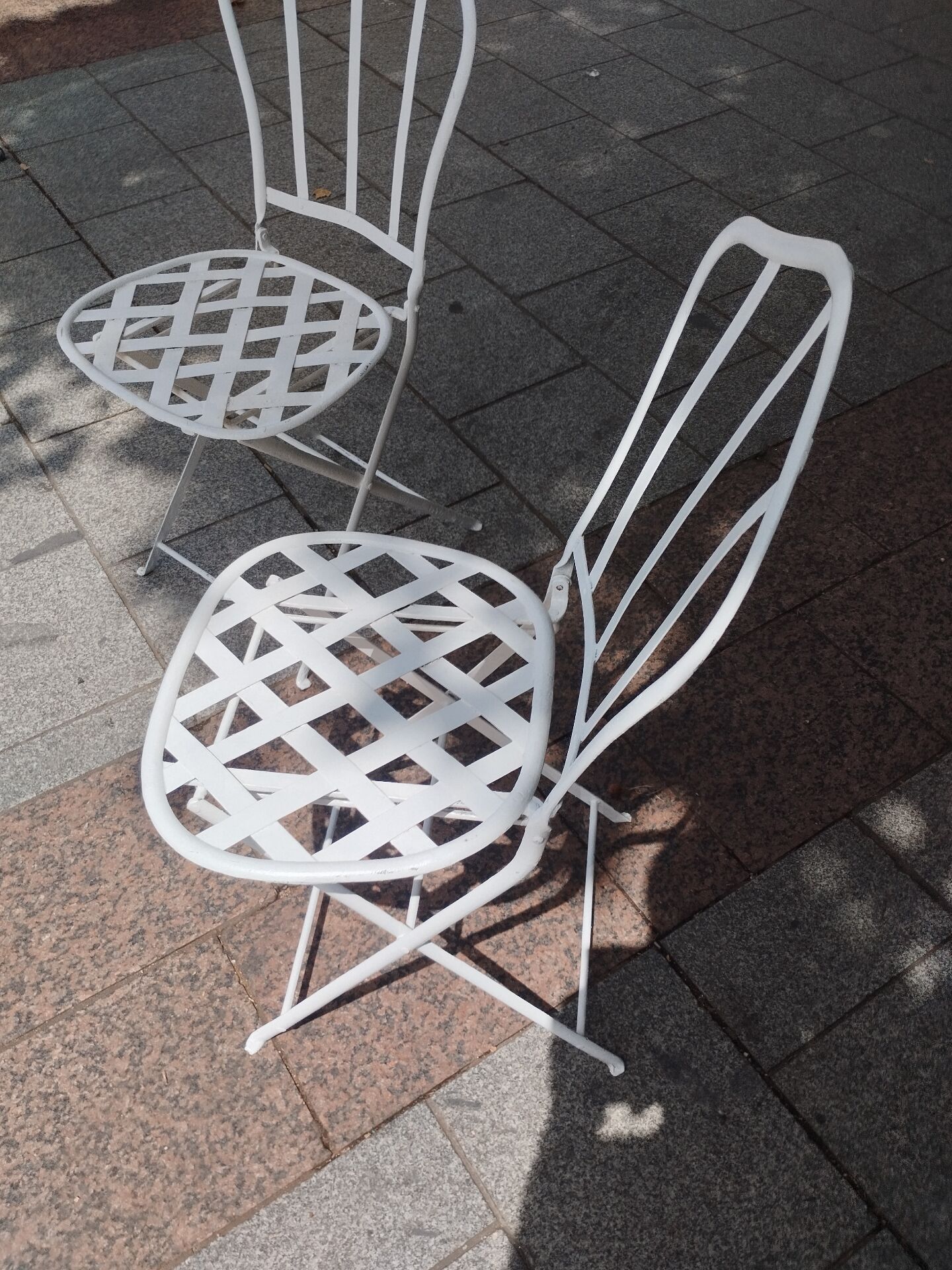 Antique garden furniture in solid wrought iron.