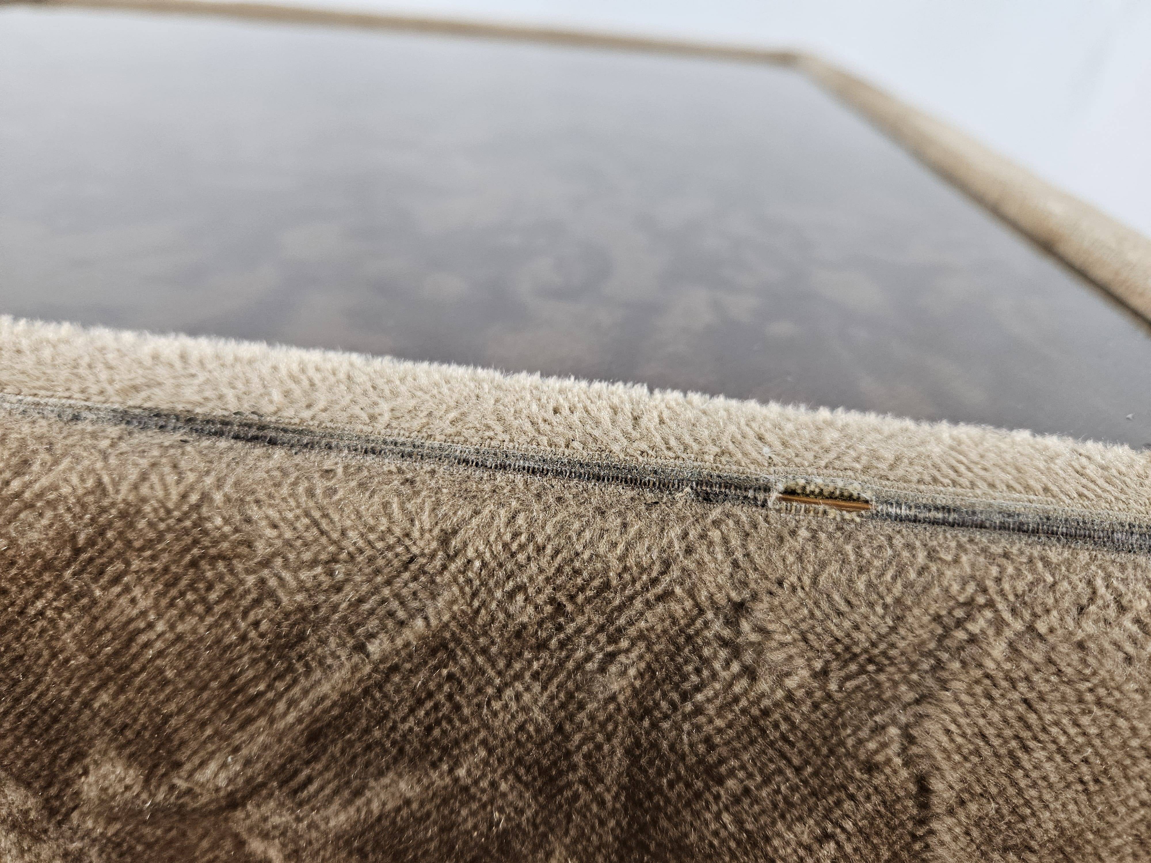 1970s coffee table covered in fabric with glass top