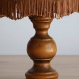 Table lamp in turned wood and umbrella-style leather lampshade