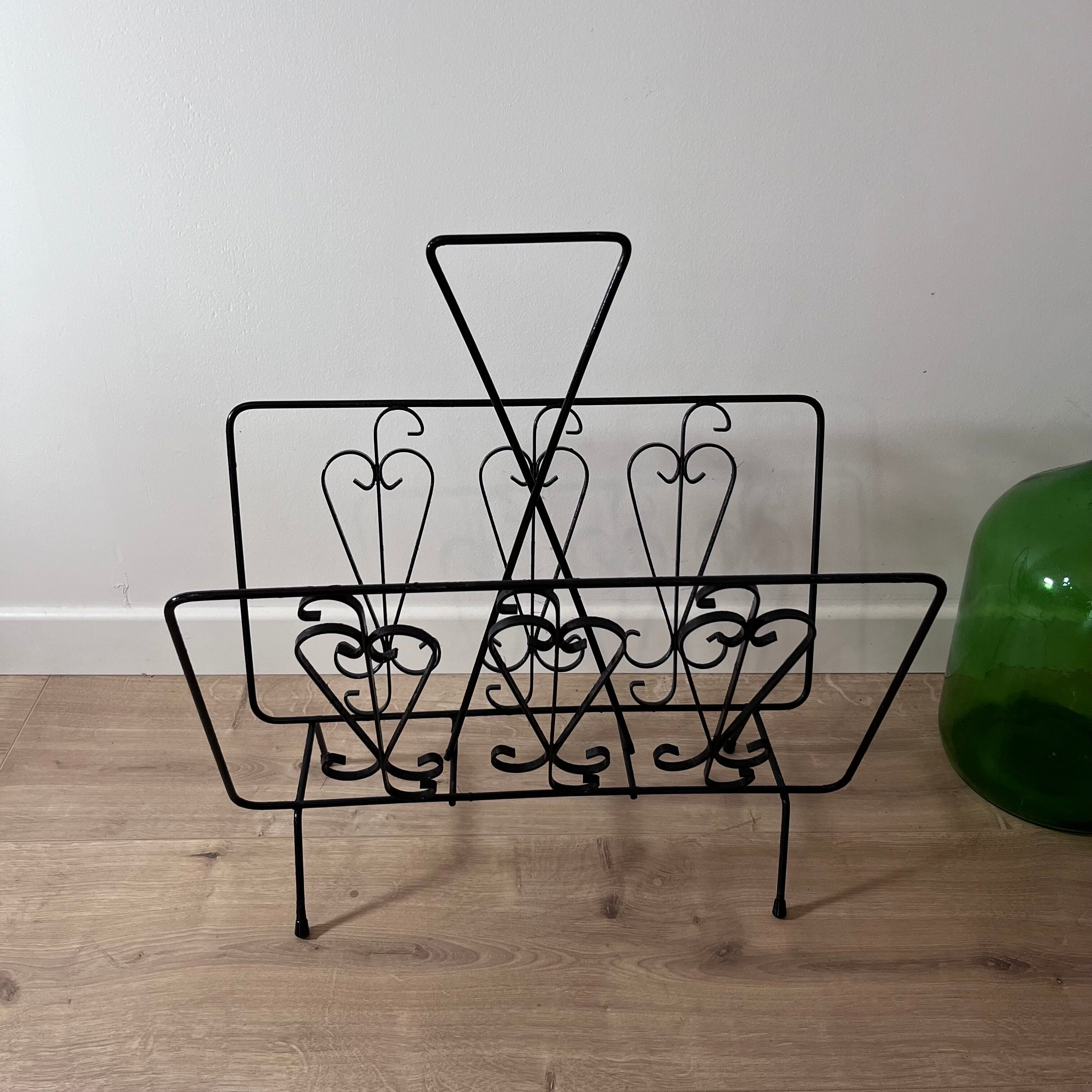 Black steel magazine holder