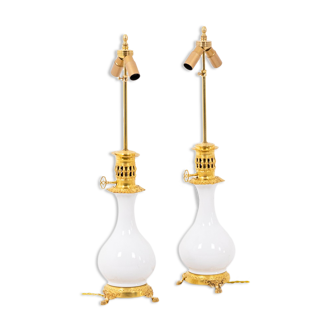 Pair of white and bronze porcelain lamps, circa 1880