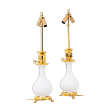 Pair of white and bronze porcelain lamps, circa 1880