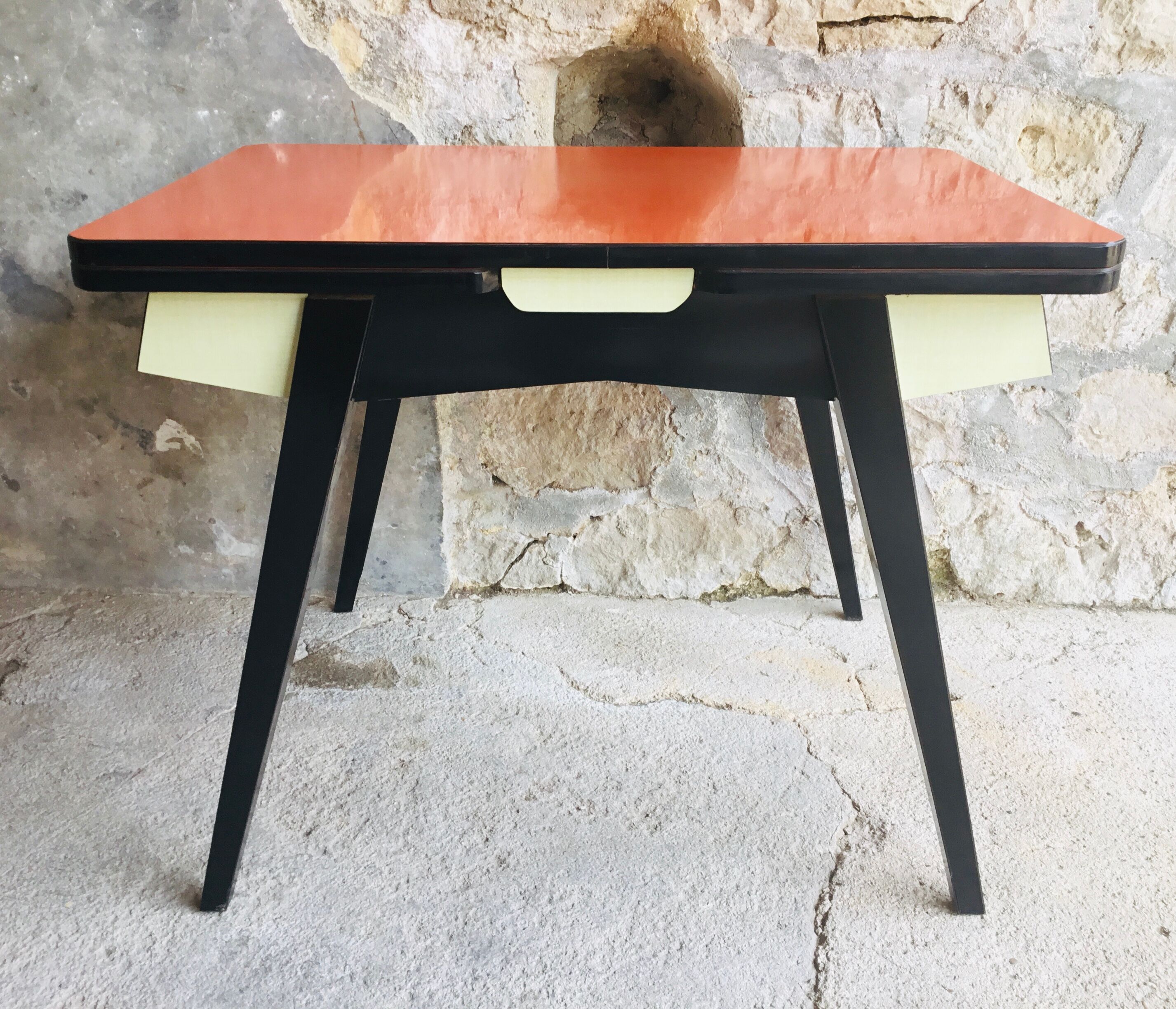 Vintage table with extension cords and orange-red formica drawers feet compass - 1960