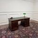 Classic English desk with green leather inlay.