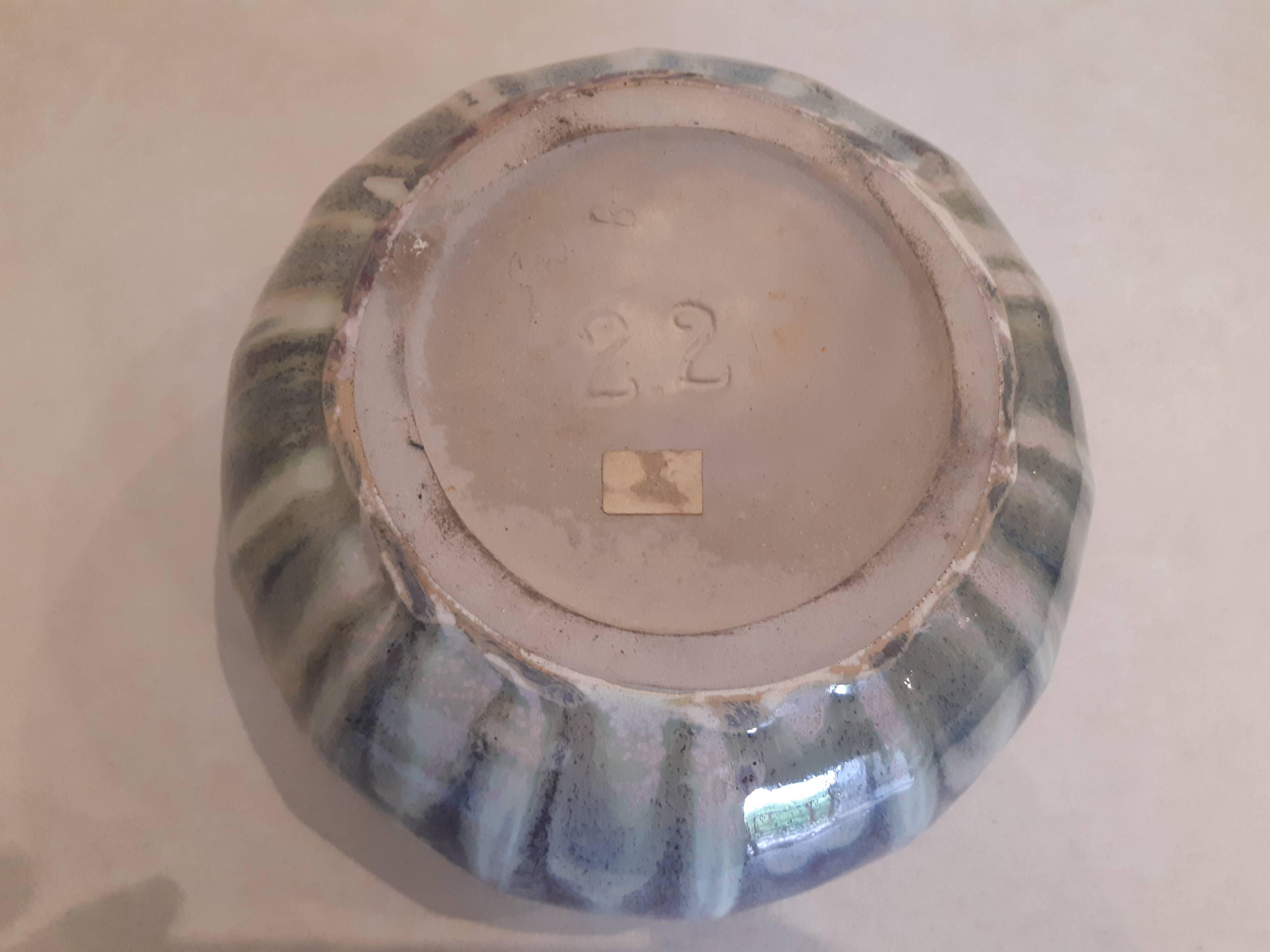 Globe vase, narrow neck, wide body.