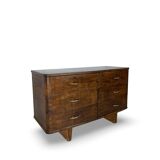 A vintage Italian chest of drawers, made of veneered walnut and solid wood,