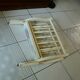 Folding magazine rack in vintage white wood