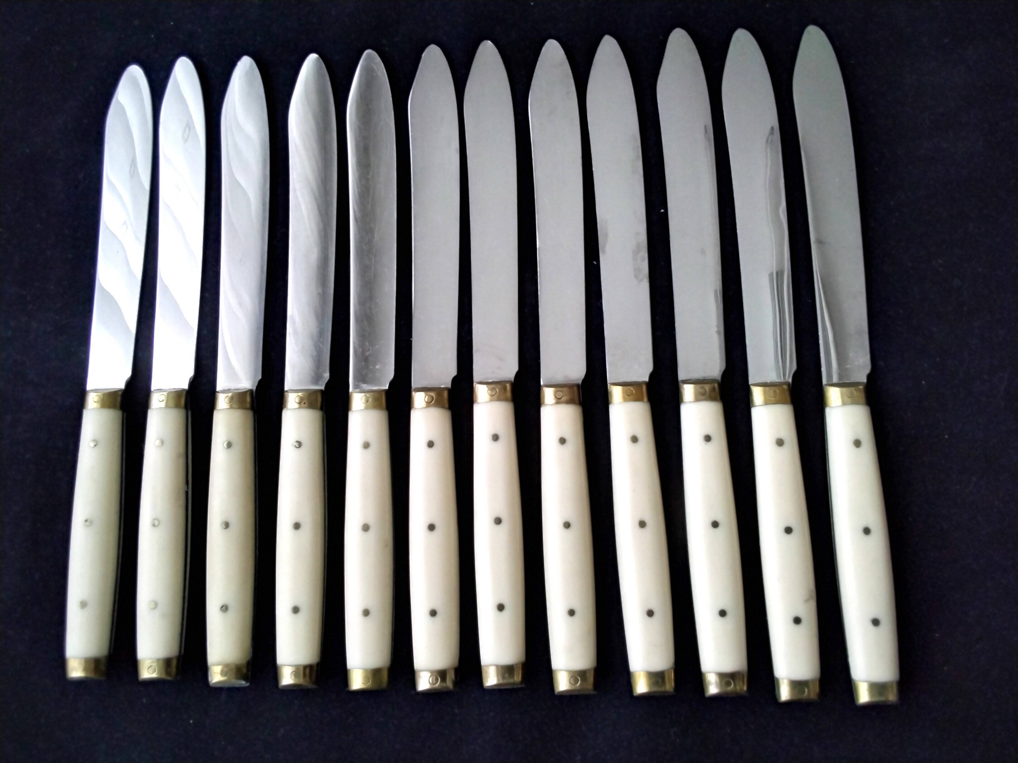 12 vintage bakelite brass and stainless steel table knives
