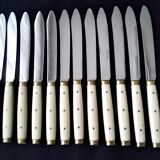 12 vintage bakelite brass and stainless steel table knives