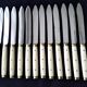 12 vintage bakelite brass and stainless steel table knives