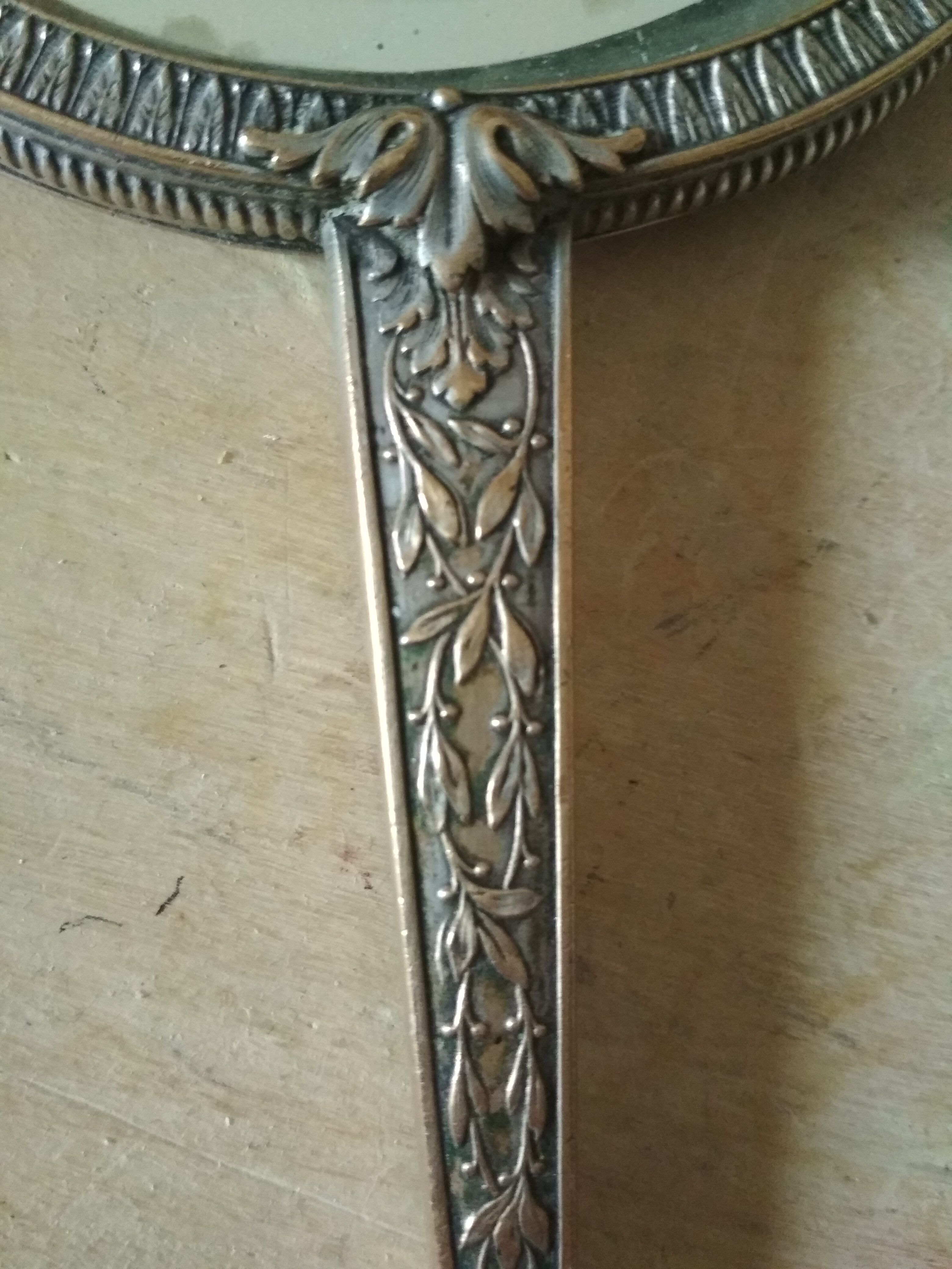 Old hand mirror beveled glass