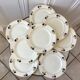 Lot de 7 assiettes plates Terre de Fer modèle "Romeo" début XXème