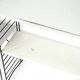 Tomado floor shelf in shades of gray