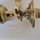 Duo of brass balance wall candle holders