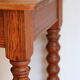 Large console or shop sideboard in pitch pine, early 20th century.