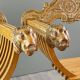 Pair of Renaissance-style folding armchairs, early 20th century