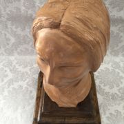 Bust in raw earth of atelier bust face of woman signed j.c.g.
