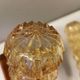 A set of Danish wall lights in champagne coloured glass with brass and teak.