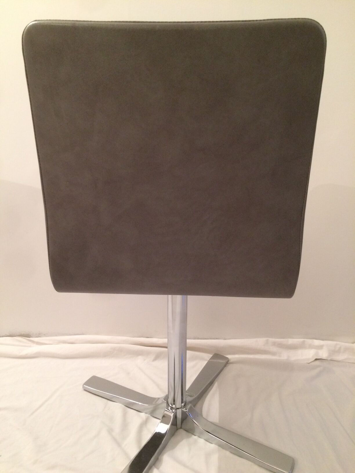 Table in white Formica, 3 chairs and 1 stool in gray leatherette