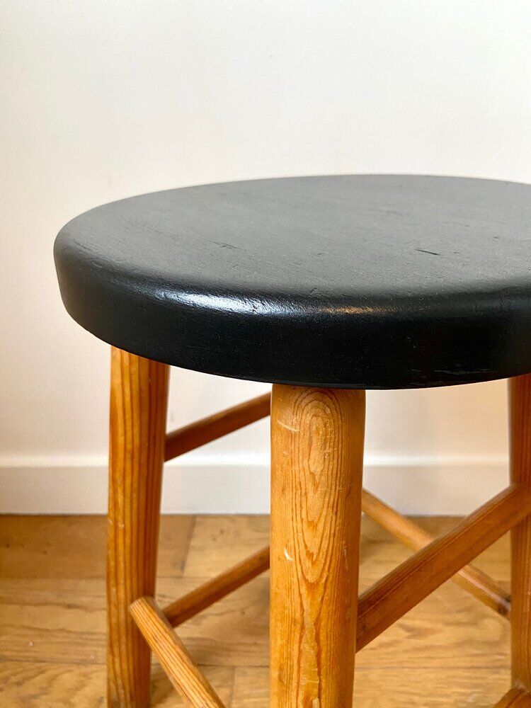 Light and black wooden stool