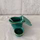 Mustard and salt pepper shaker in the shape of a toilet.