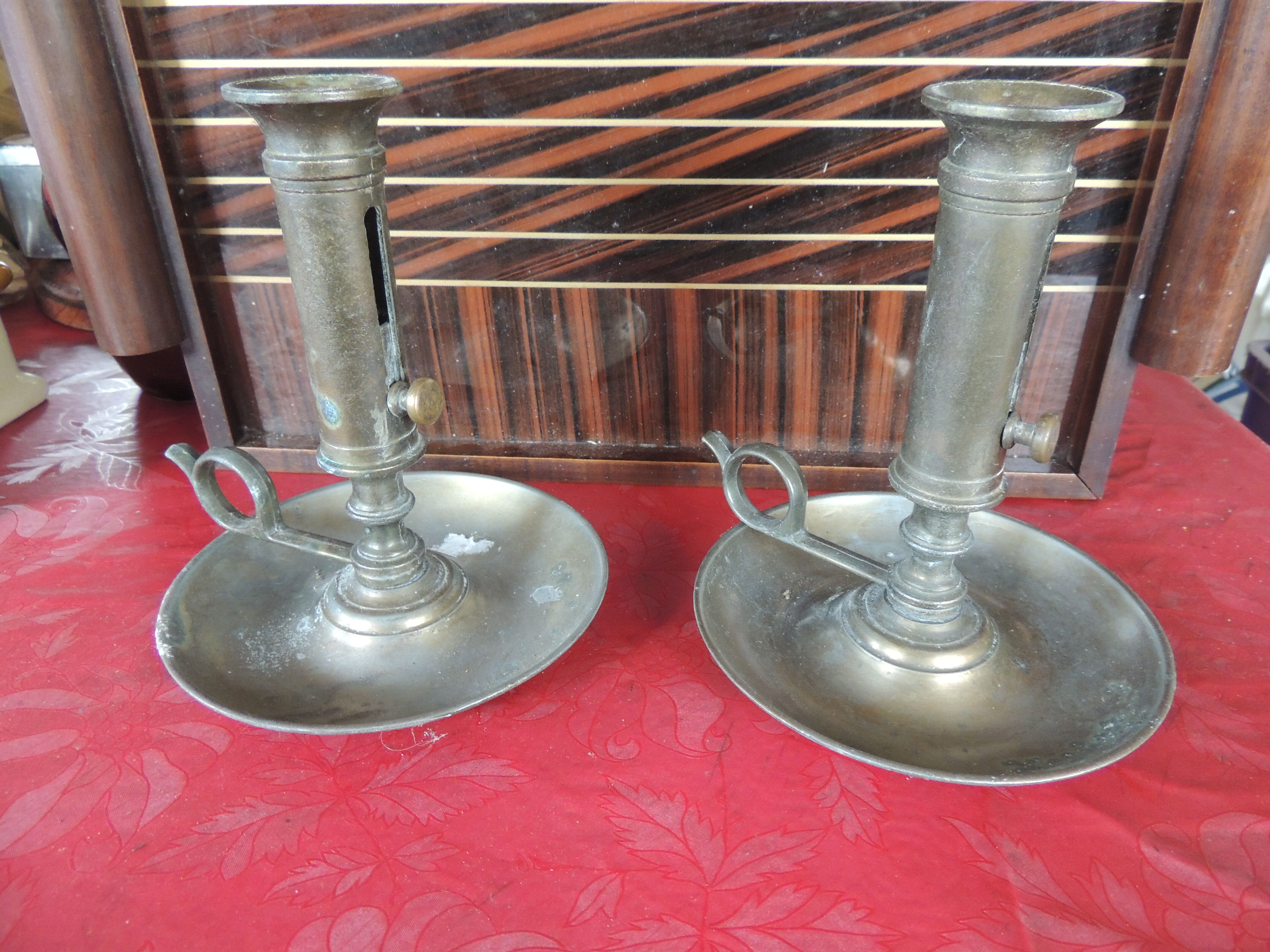 Pair of hand candle holders with pusher