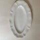 Shaped plates and dishes in Sarreguemines earthenware.
