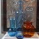 Trio vintage vase bottle and jar in amber and blue glass