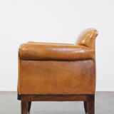 Restored antique Art Deco sheep leather armchair