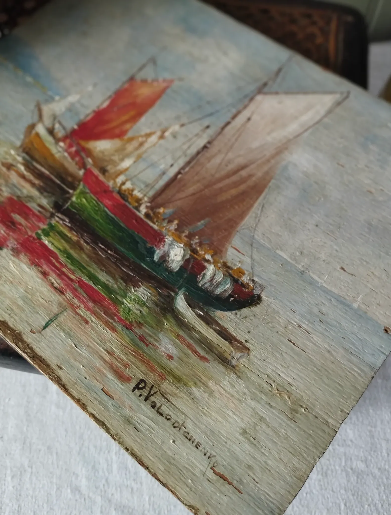 Fishing boats on calm sea. oil painting signed p. volotchenko.