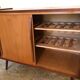 Vintage storage cabinet sliding doors feet compass