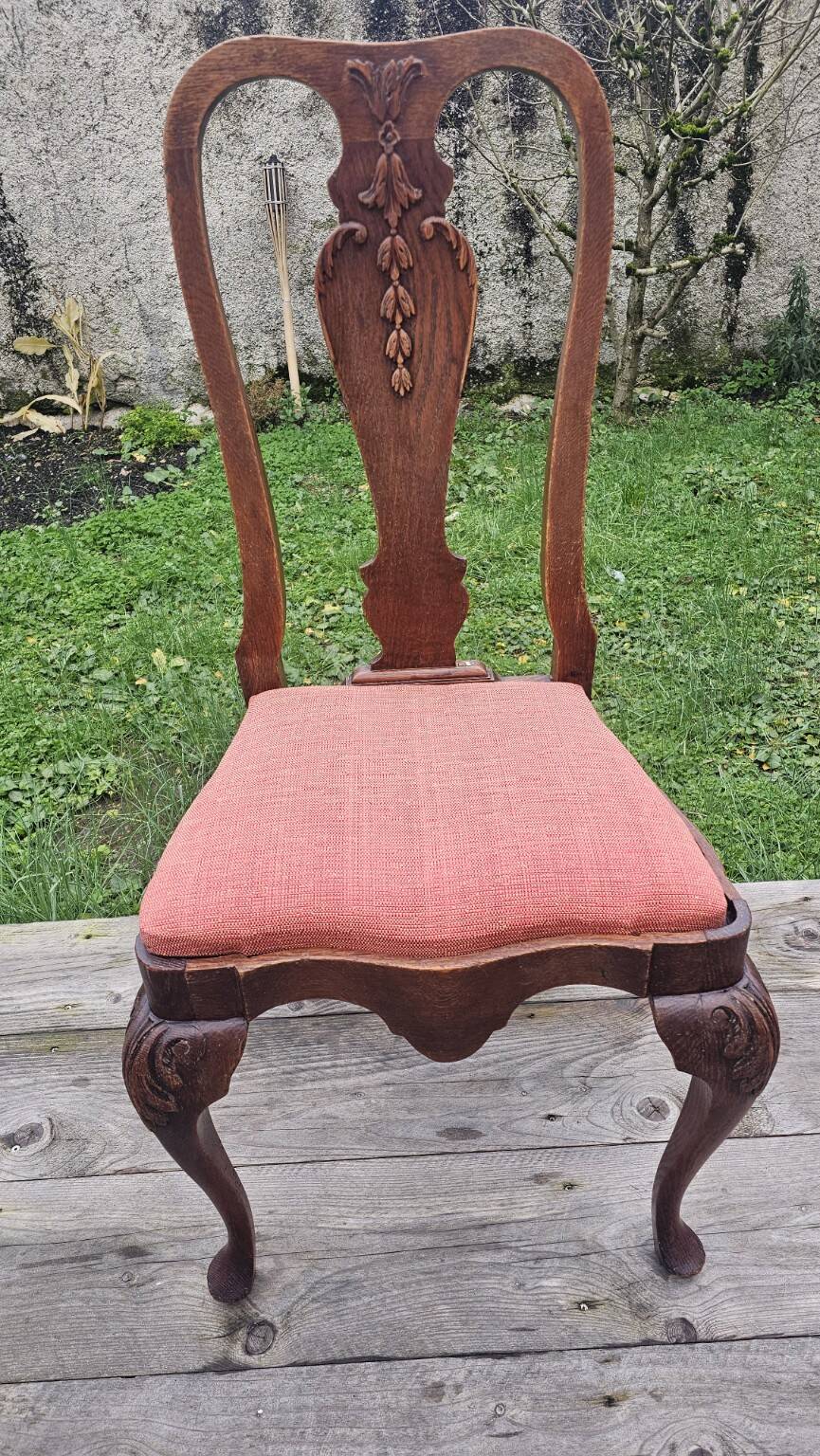 Set of 4 carved wooden chairs from the late 19th century in the Dutch style.