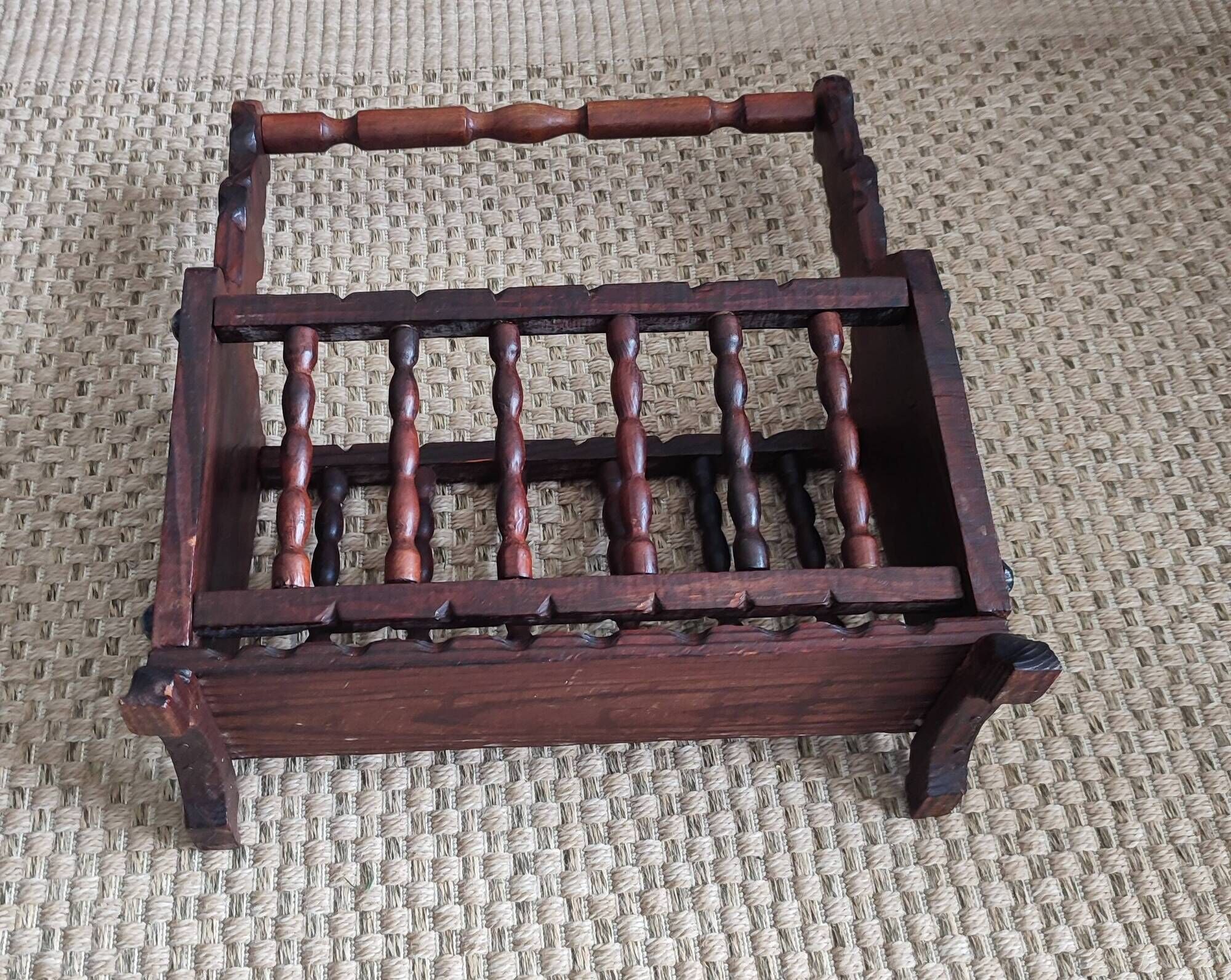 Rustic stained wooden magazine rack