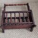 Rustic stained wooden magazine rack