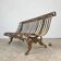 Cast iron garden bench from the late 19th century with slatted backrest.