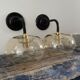 Pair of vintage electrified smoked glass wall lamps