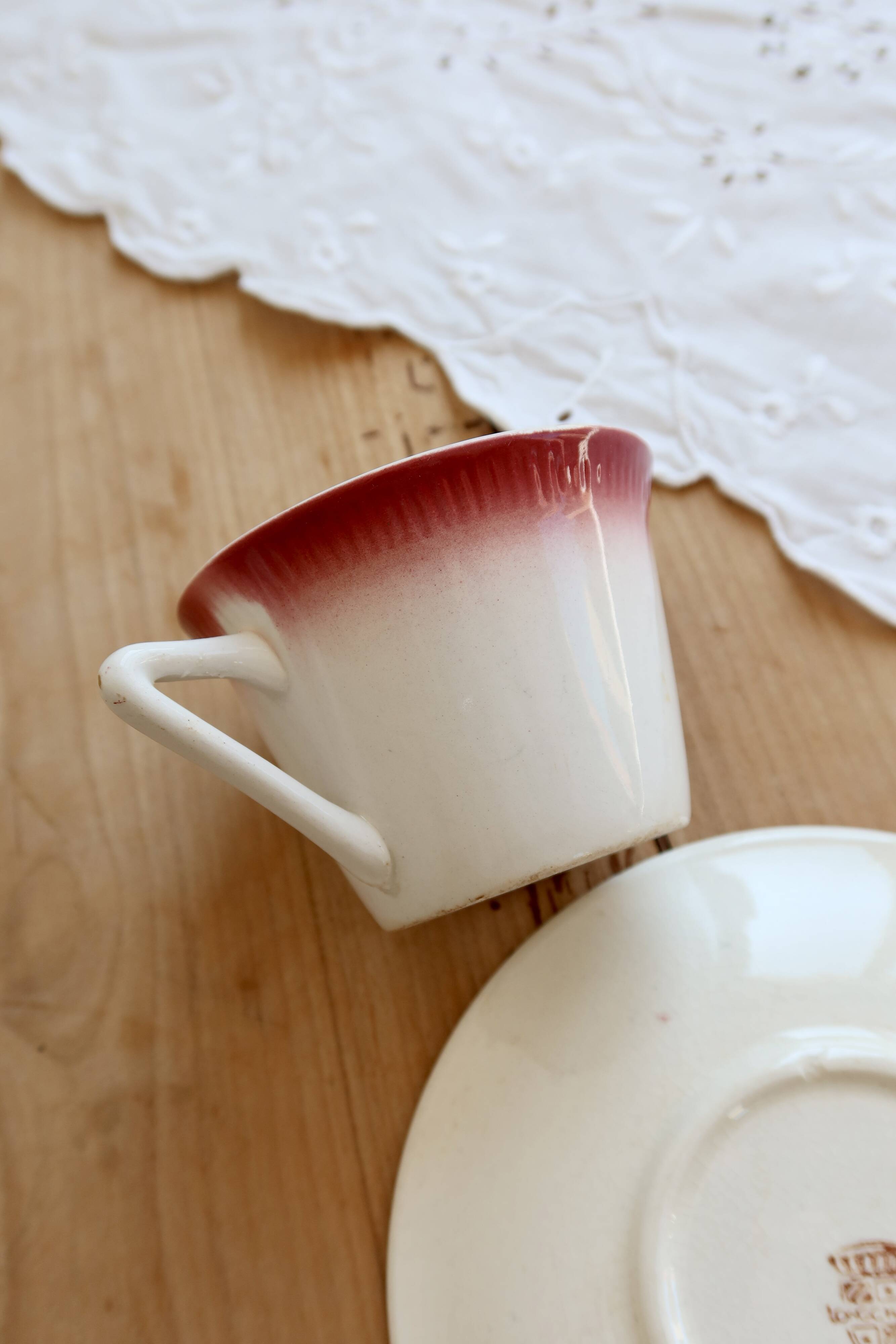 Antique Longchamp ironstone coffee cup with saucer.