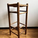 Low wooden and straw stool