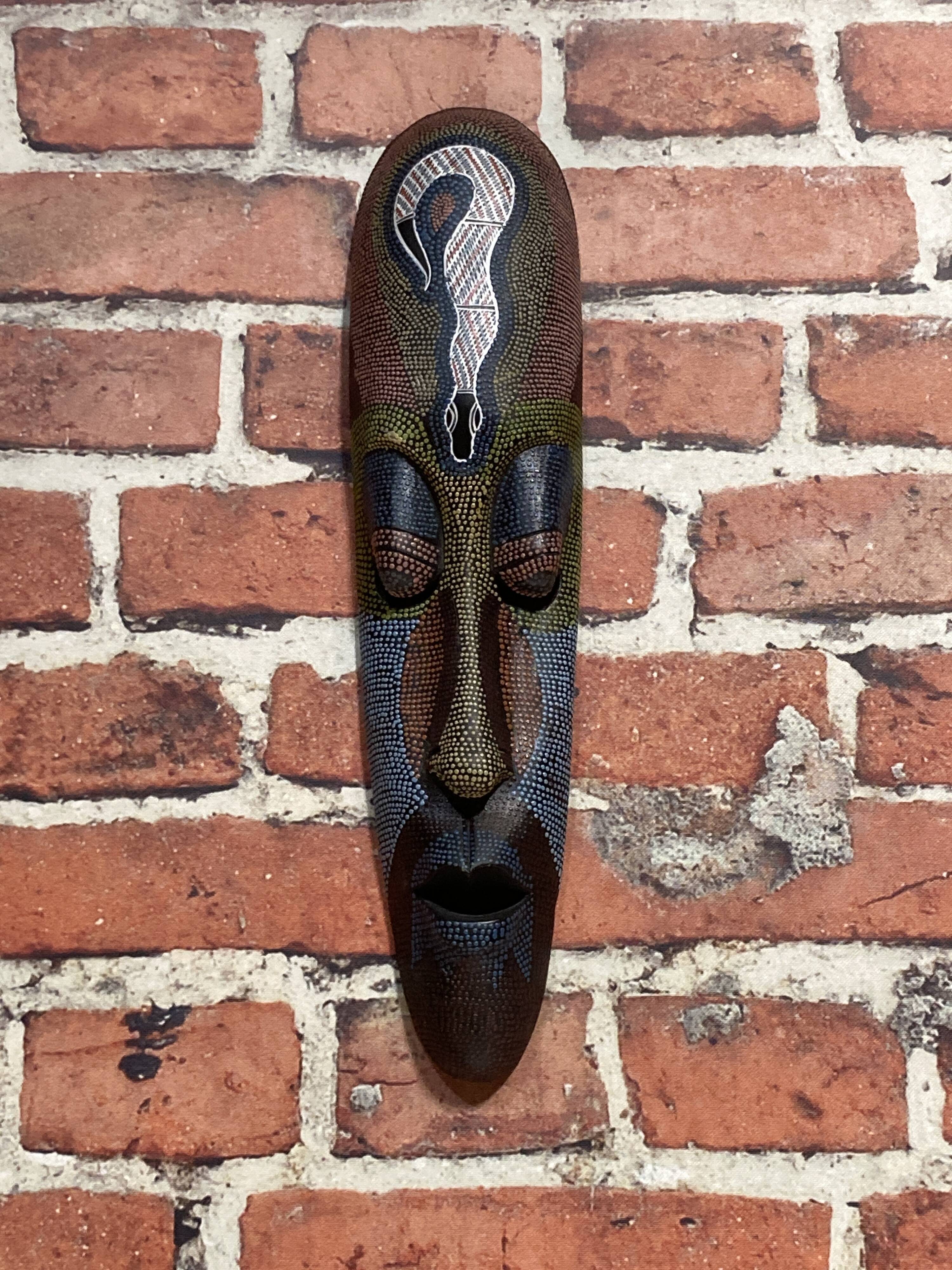Wooden wall mask.