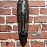 Wooden wall mask.