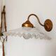 Pair of swan neck and serrated opaline wall lights