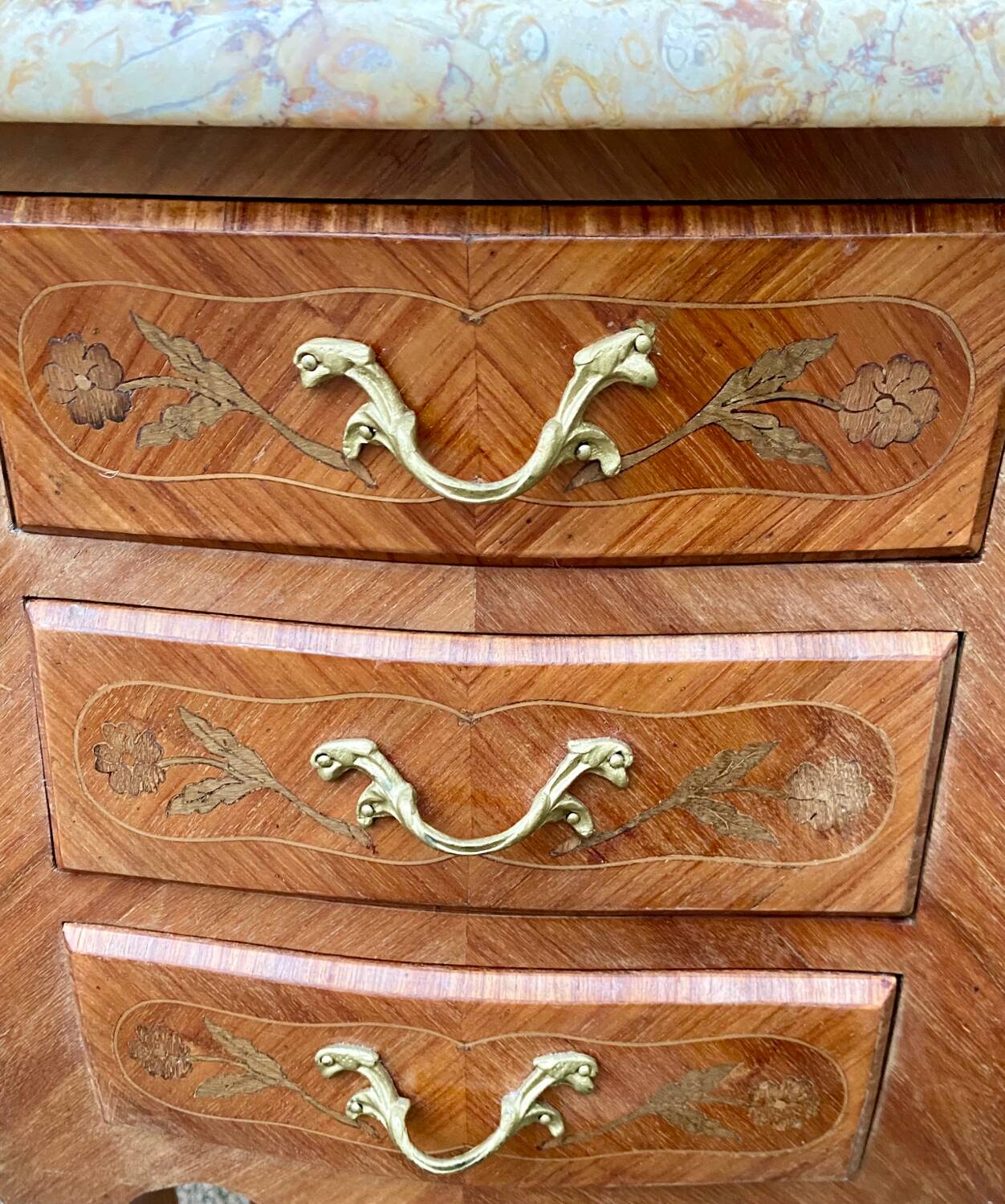 Pair of Louis XV style bedside tables with rosewood marquetry