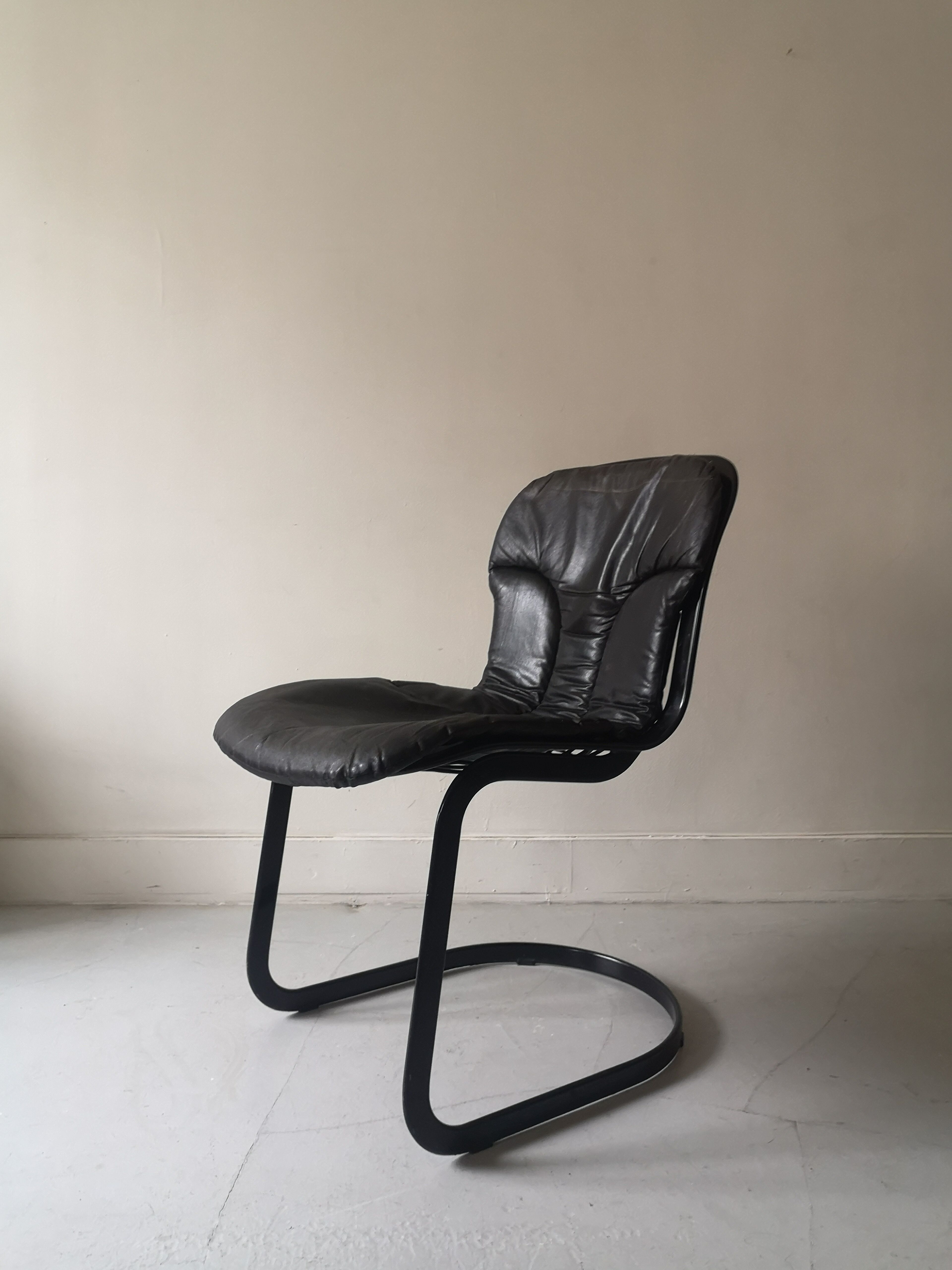 Black metal chair and leather cidue, italy 1970