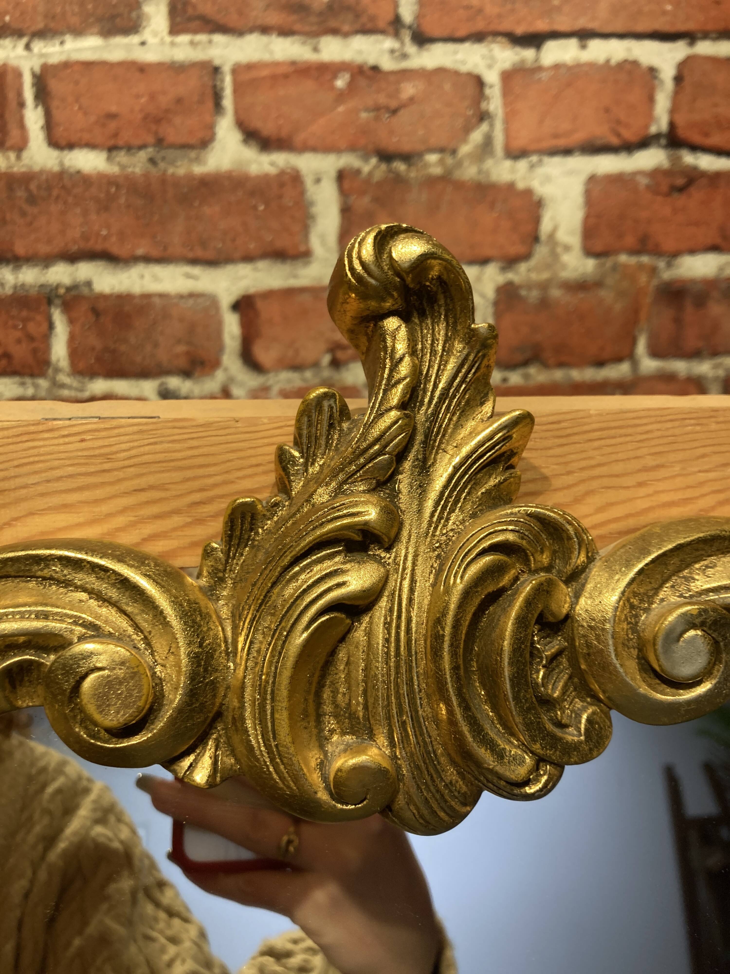 Wooden mirror with moldings