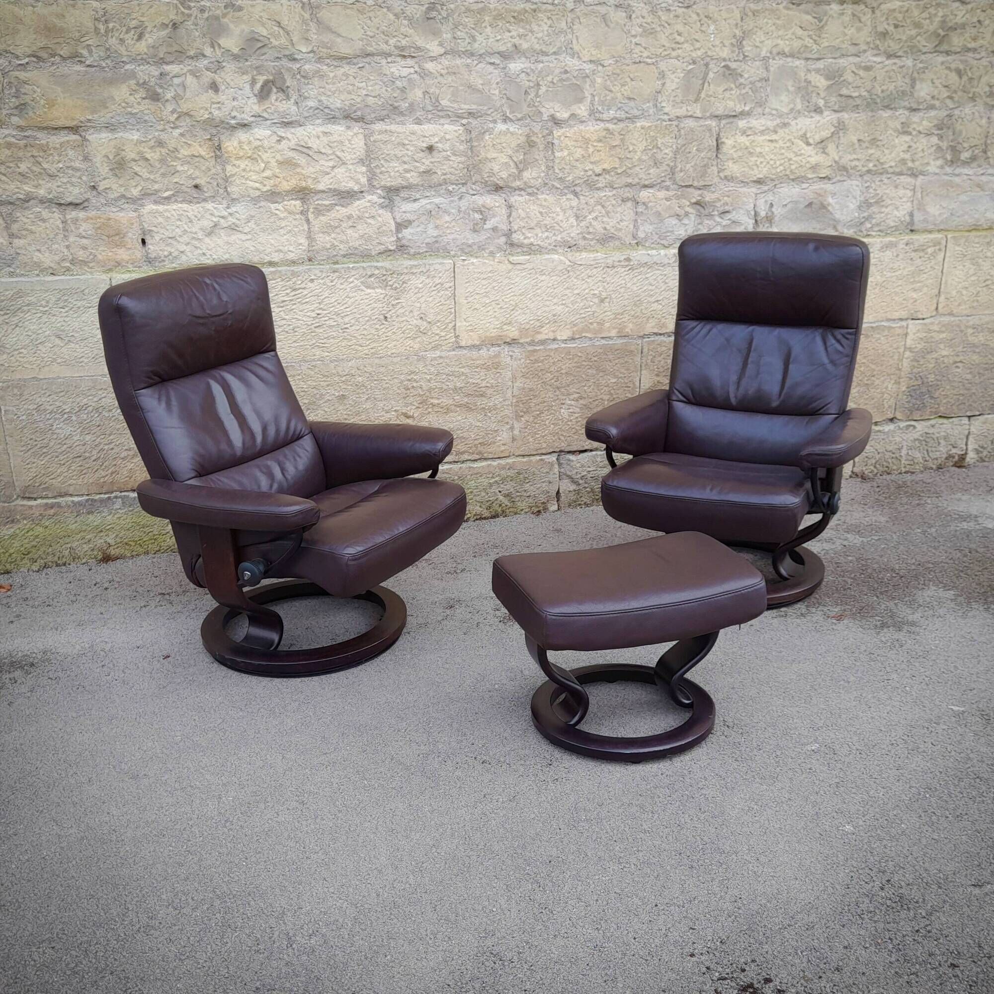 Pair of Scandinavian leather armchairs and ottoman, Ekornes, Norway, 1970
