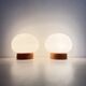 Ensemble de 2 lampes de table en bois de pin et en verre opalin, années 1970.